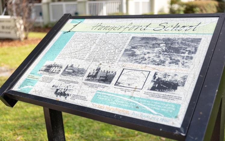 Photo of the Historic Marker for the Hungerford Property worn and tattered difficult to read